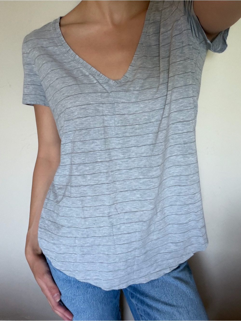 Lululemon grey pinstriped v-neck t-shirt, size small.